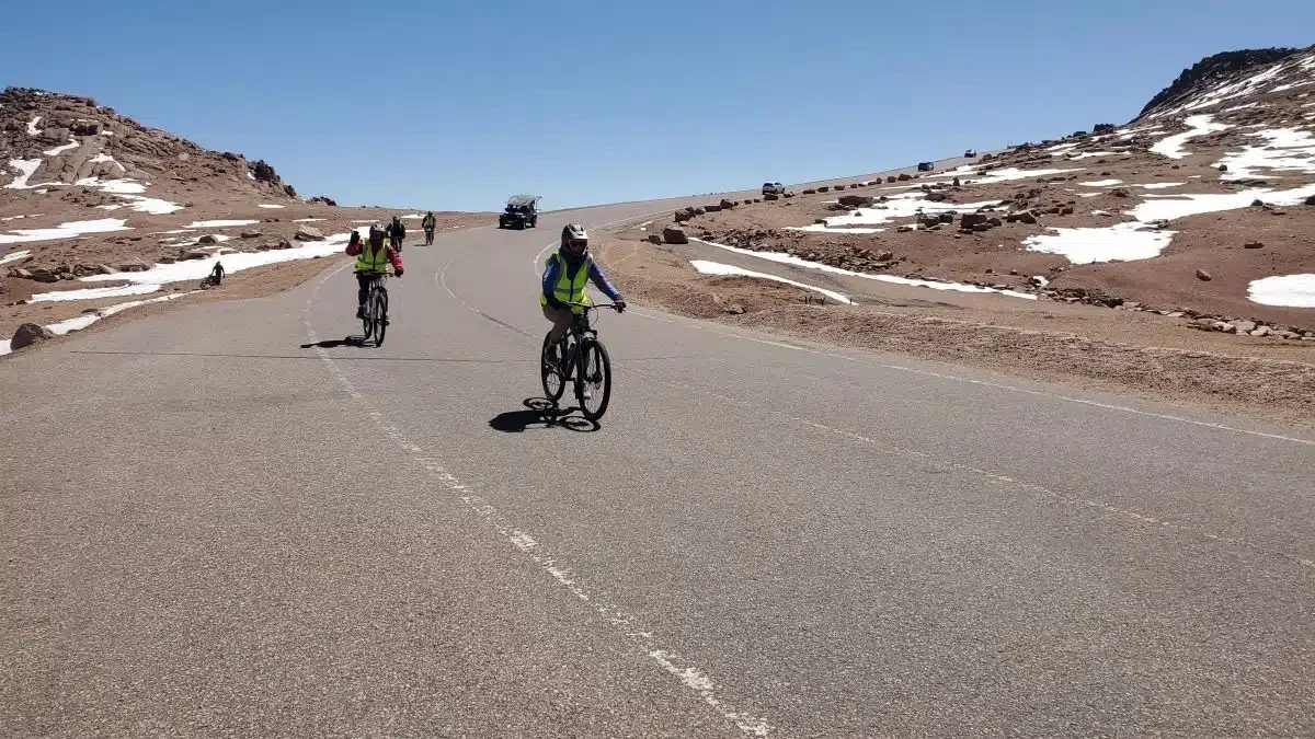 The ride near the top is a barren landscape above the treeline when we rode bicycles down Pikes Peak.