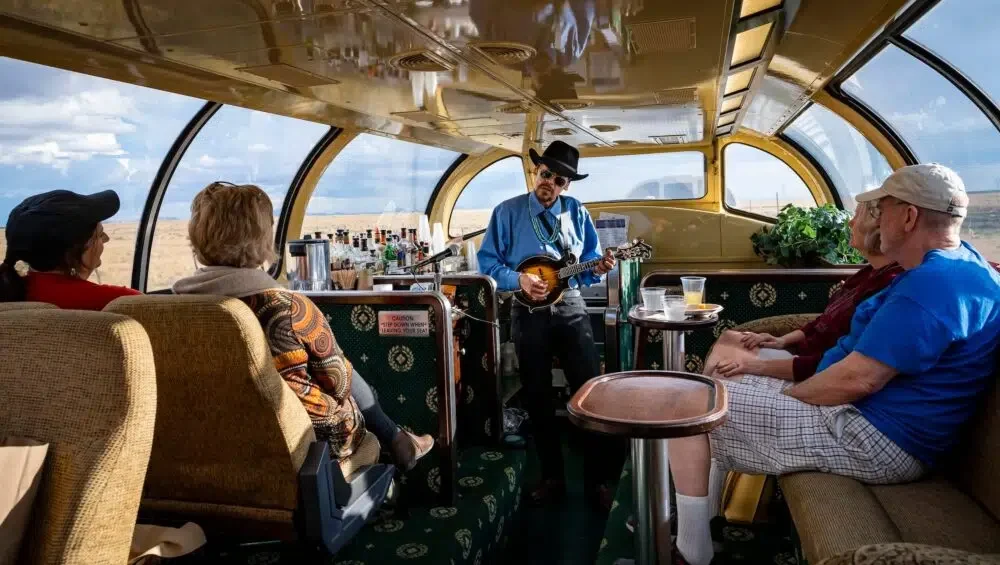 Some cars on the Grand Canyon Railway offer entertainment, a bar and complimentary snacks. Credit: © Xanterra Travel Collection