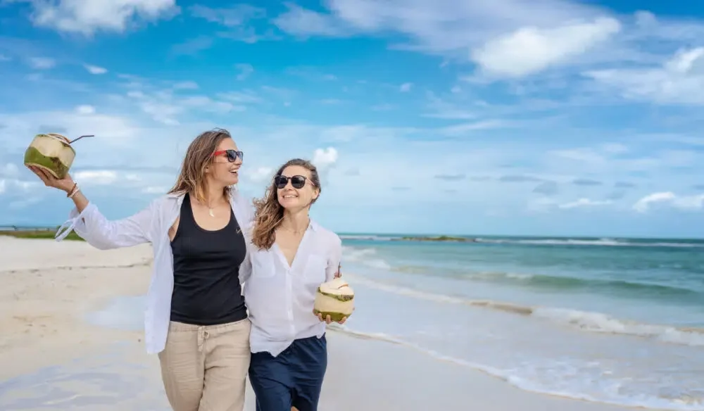 female couple on a beach in Barbados