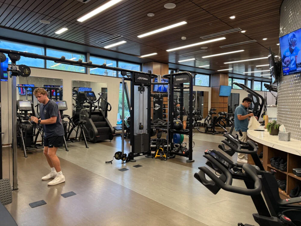 man working out on exercise equipment