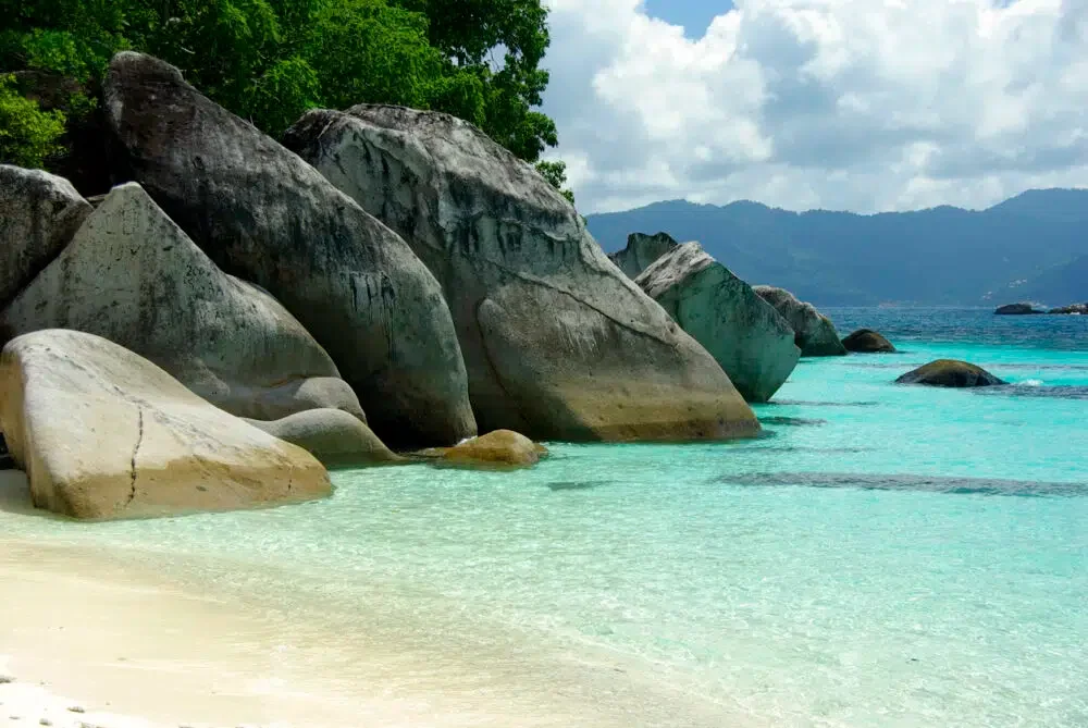 Boulders at the edge of the sea on Tioman Island. Tioman is easily accessible via Dolphin Fast Ferry